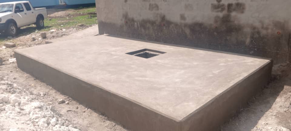 SWASH and Shule Mfano concrete slab construction progress in Zanzibar.